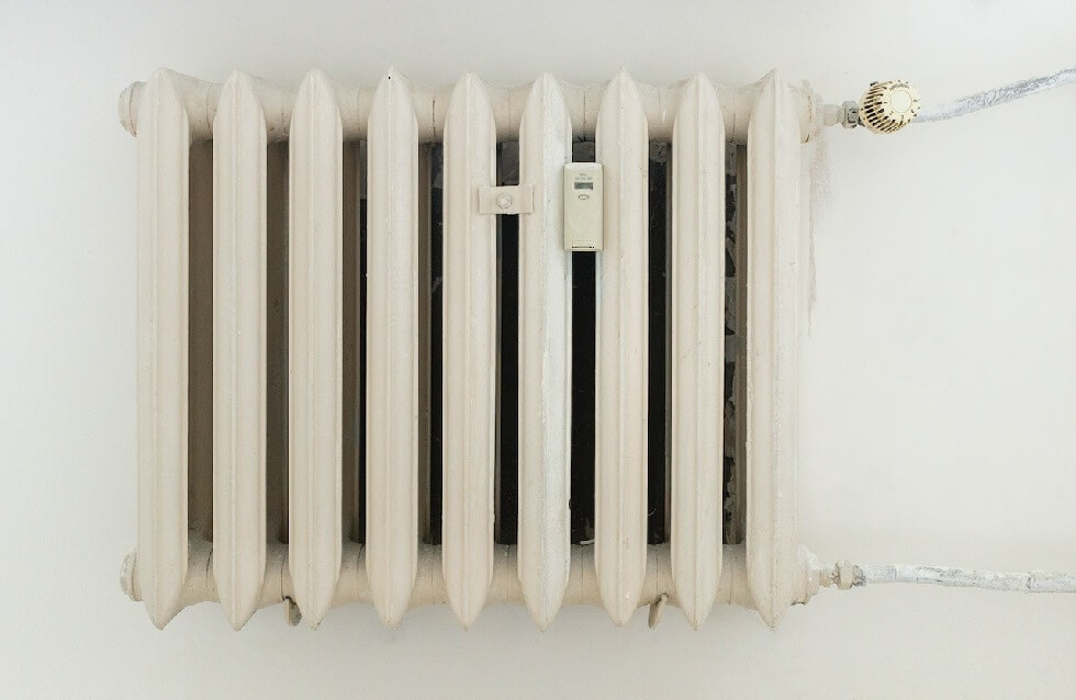 paint a radiator a sheet of dust behind the heater